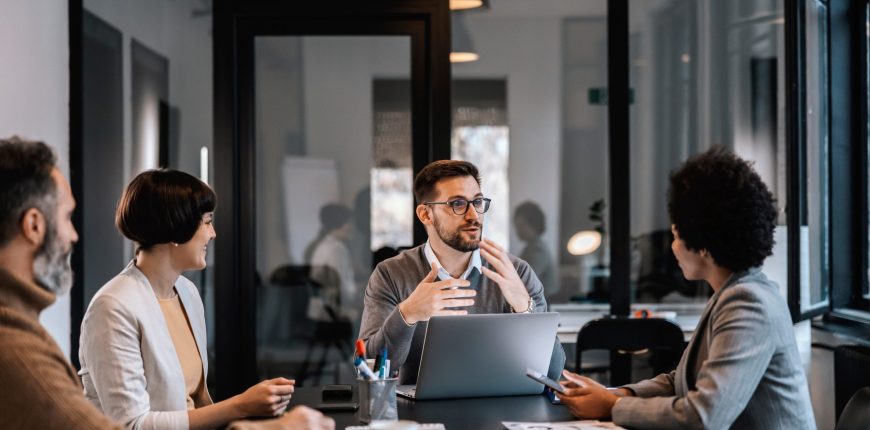 A,Focused,Mentor,Is,Explaining,Project,To,Mentees,At,The